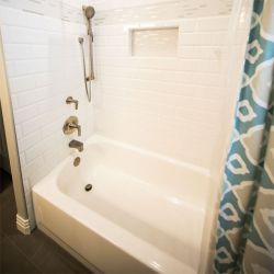 Whirlpool baths with or without a shower?